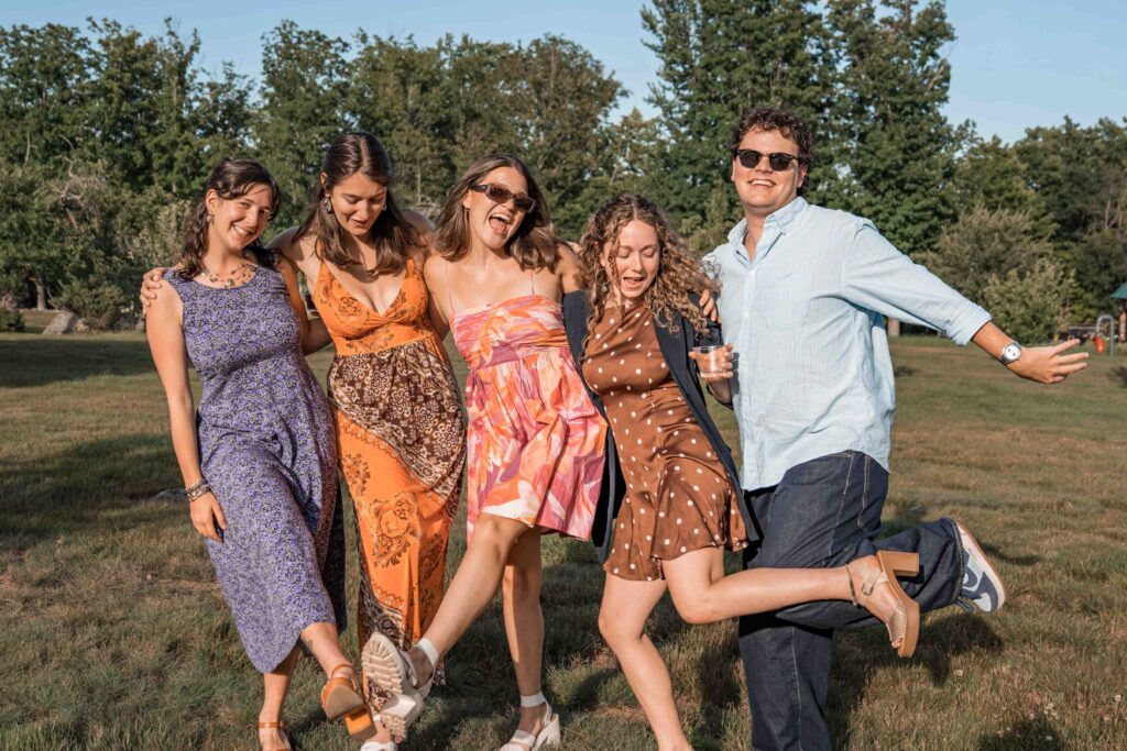 Friends posing at A wedding pre-party at The Preserve at Chocorua in Tamworth, New Hampshire